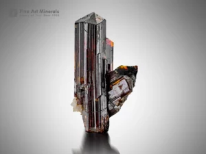 Dark metallic rutile crystal cluster with fiery red reflections from Zagi Mountain, Pakistan.