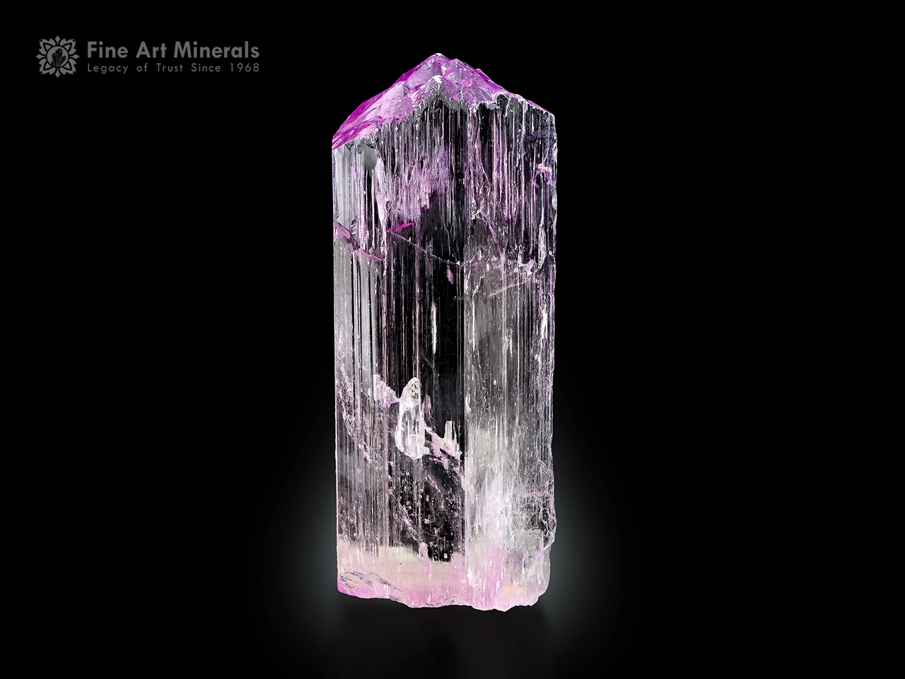 Spodumene var. Kunzite crystal Afghanistan (1) Clear lilac Kunzite crystal from Afghanistan with vertical striations and natural termination.