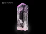 Clear lilac Kunzite crystal from Afghanistan with vertical striations and natural termination.