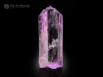 Clear lilac Kunzite crystal from Afghanistan with vertical striations and natural termination.