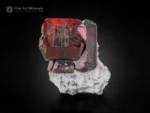 Dark tantalite-(Mn) crystals on white albite matrix from Afghanistan.
