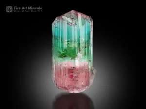Natural tourmaline crystal with green and seafoam blue upper section transitioning to pink base, well-terminated with vertical striations.
