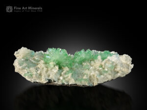 Mint-green apophyllite crystals on white stilbite matrix from Pashan Hill Quarry, India.