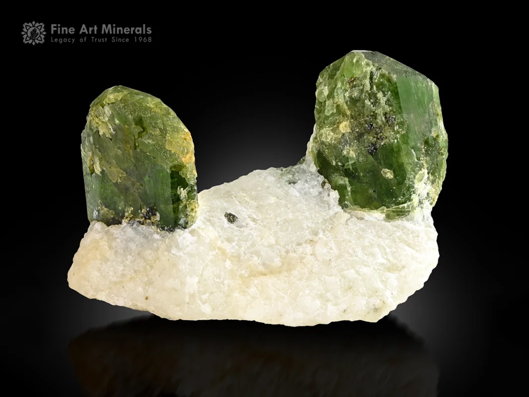 Green diopside crystals on white matrix with attractive contrast and natural crystal form.