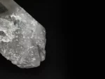Large doubly terminated Quartz crystal with glassy luster and sharp termination.