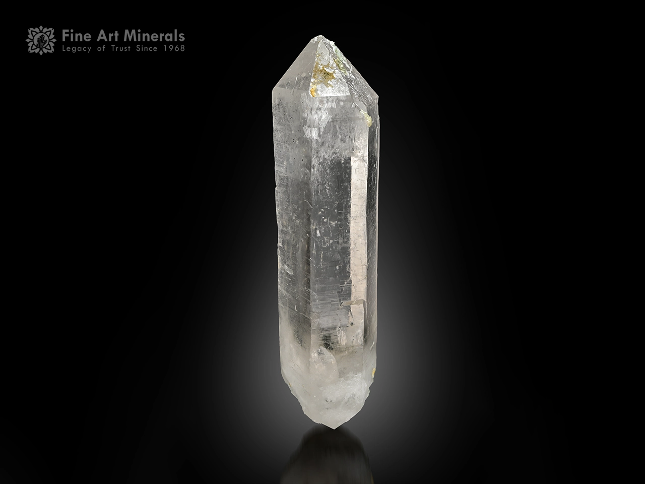 Large doubly terminated Quartz crystal with glassy luster and sharp termination.