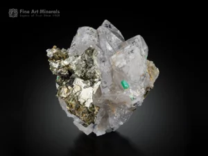 Green emerald crystals on quartz matrix with lustrous pyrite from Colombia.