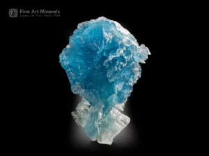 Large etched aquamarine crystal from Pedra Azul, Minas Gerais, Brazil, with vibrant blue color and naturally sculpted crystal form.