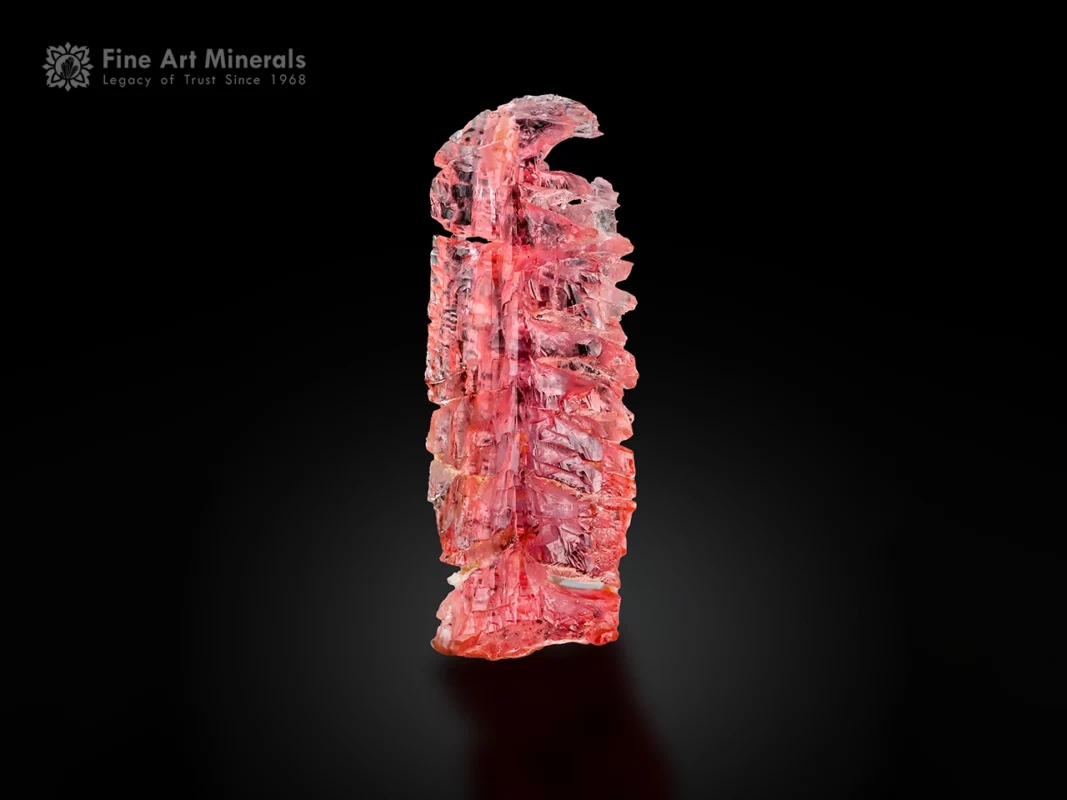 Etched pinkish-red vayrynenite crystal with superb color and vitreous luster from Shengus, Pakistan.