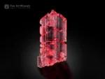 Elongated raspberry-red vayrynenite crystal with etched form and superb gem quality from Pakistan