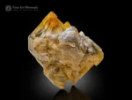 Golden window quartz crystal cluster with sharp terminations and brilliant luster.