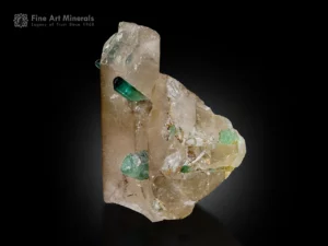 Green tourmaline crystals on smoky quartz matrix from Afghanistan.