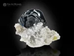 Metallic Hematite crystal on contrasting white matrix from Pakistan.