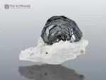 Metallic Hematite crystal on contrasting white matrix from Pakistan.