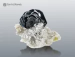 Metallic Hematite crystal on contrasting white matrix from Pakistan.