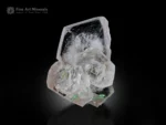 Peach-pink morganite crystal cluster with green tourmaline and albite from Afghanistan.