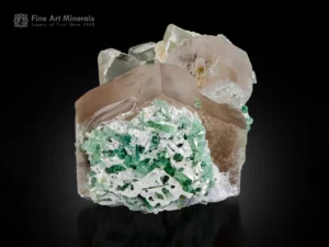 Pink morganite crystals with green tourmaline, quartz, and albite matrix from Afghanistan.