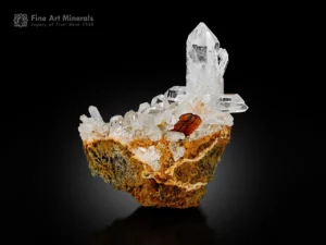 Phantom brookite crystal with sparkling quartz crystals on natural matrix.