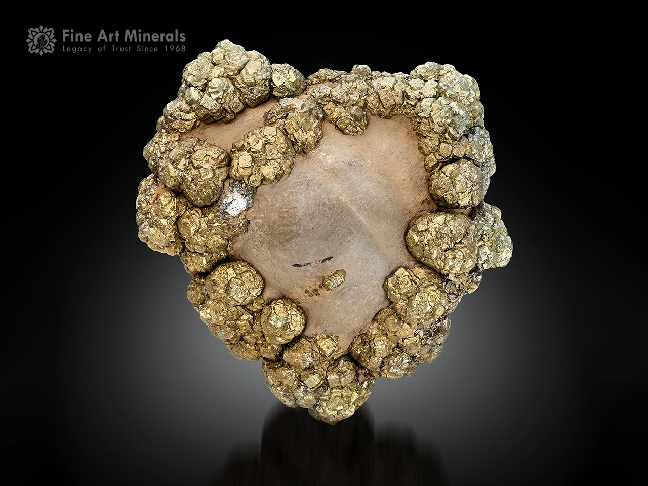 Heart-shaped pyrite crystal aggregates on limonite matrix from Abbottabad, Khyber Pakhtunkhwa, Pakistan.