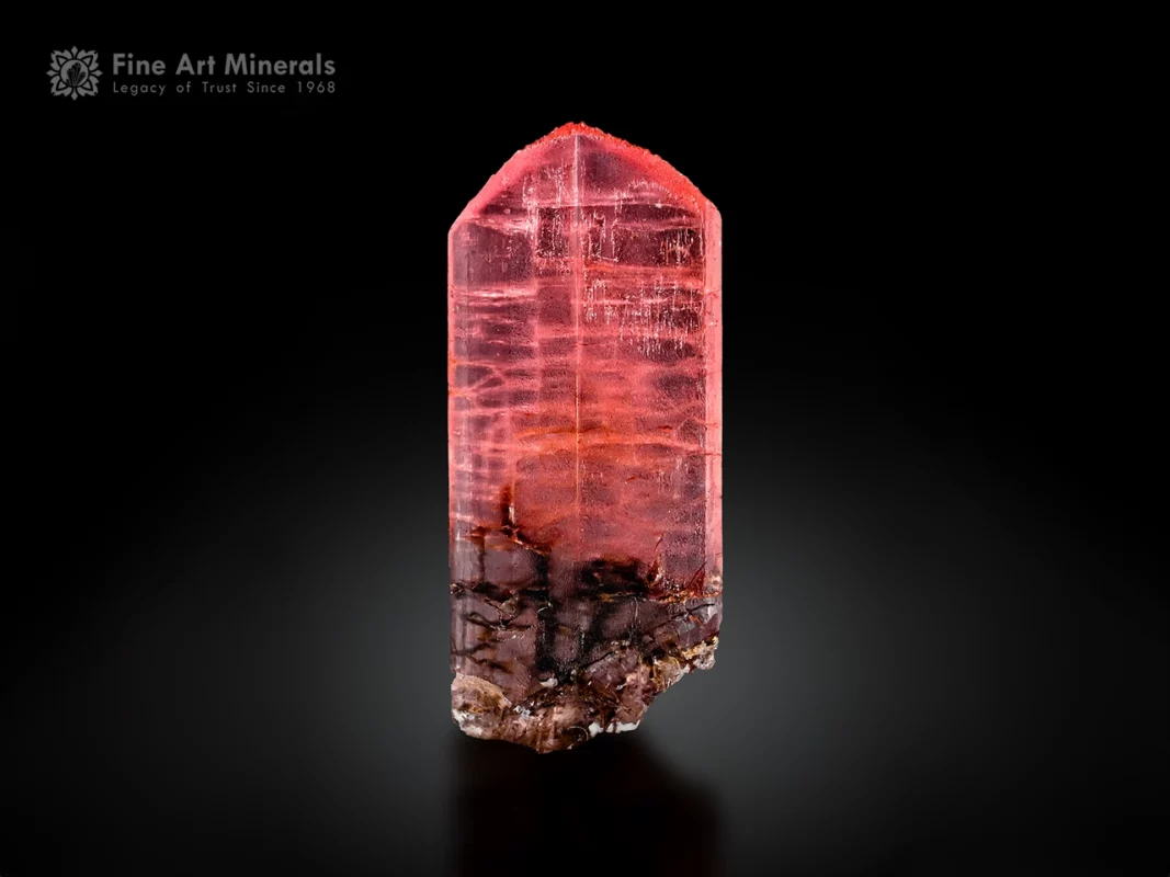 Gemmy pinkish-red vayrynenite crystal with sharp termination and excellent transparency from Shengus, Pakistan.
