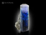 Violet-blue tanzanite crystal on matrix with sharp terminations and exceptional transparency from Merelani Hills.