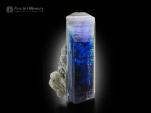 Violet-blue tanzanite crystal on matrix with sharp terminations and exceptional transparency from Merelani Hills.