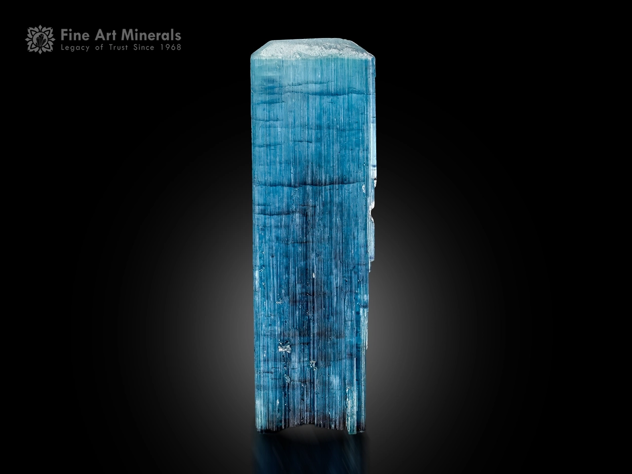 Tourmaline Crystal Afghanistan (1) Blue tourmaline crystal with flat termination, strong vertical striations, and attractive prismatic form.