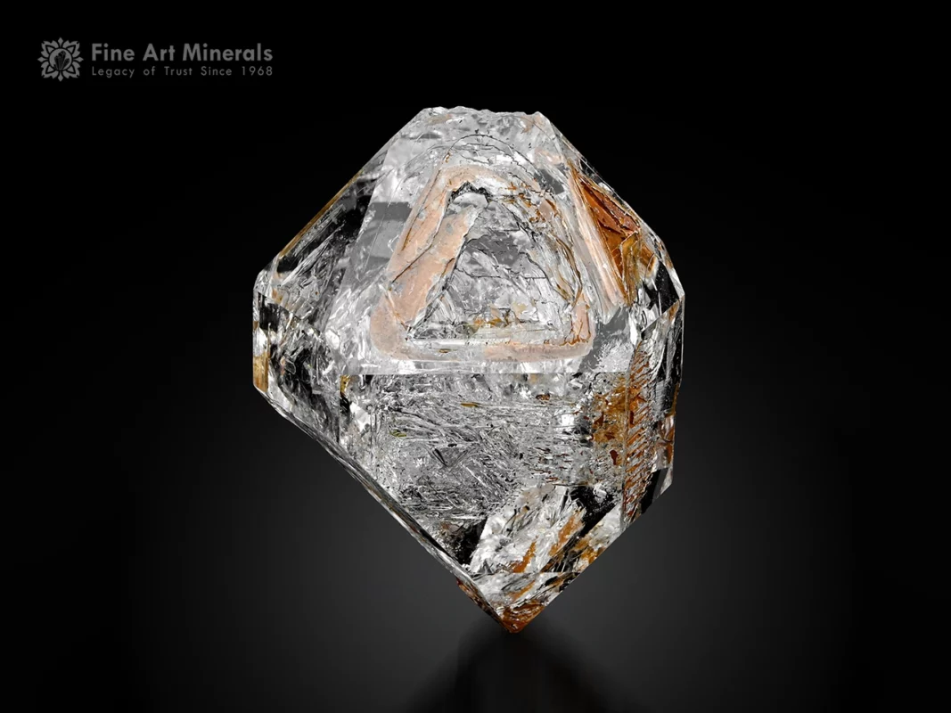 Transparent window quartz crystal with glassy luster and natural internal inclusions.