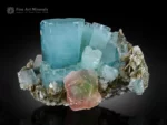 Gem-quality blue Aquamarine crystals with Fluorite and Muscovite from Chumar Bakhoor, Pakistan.